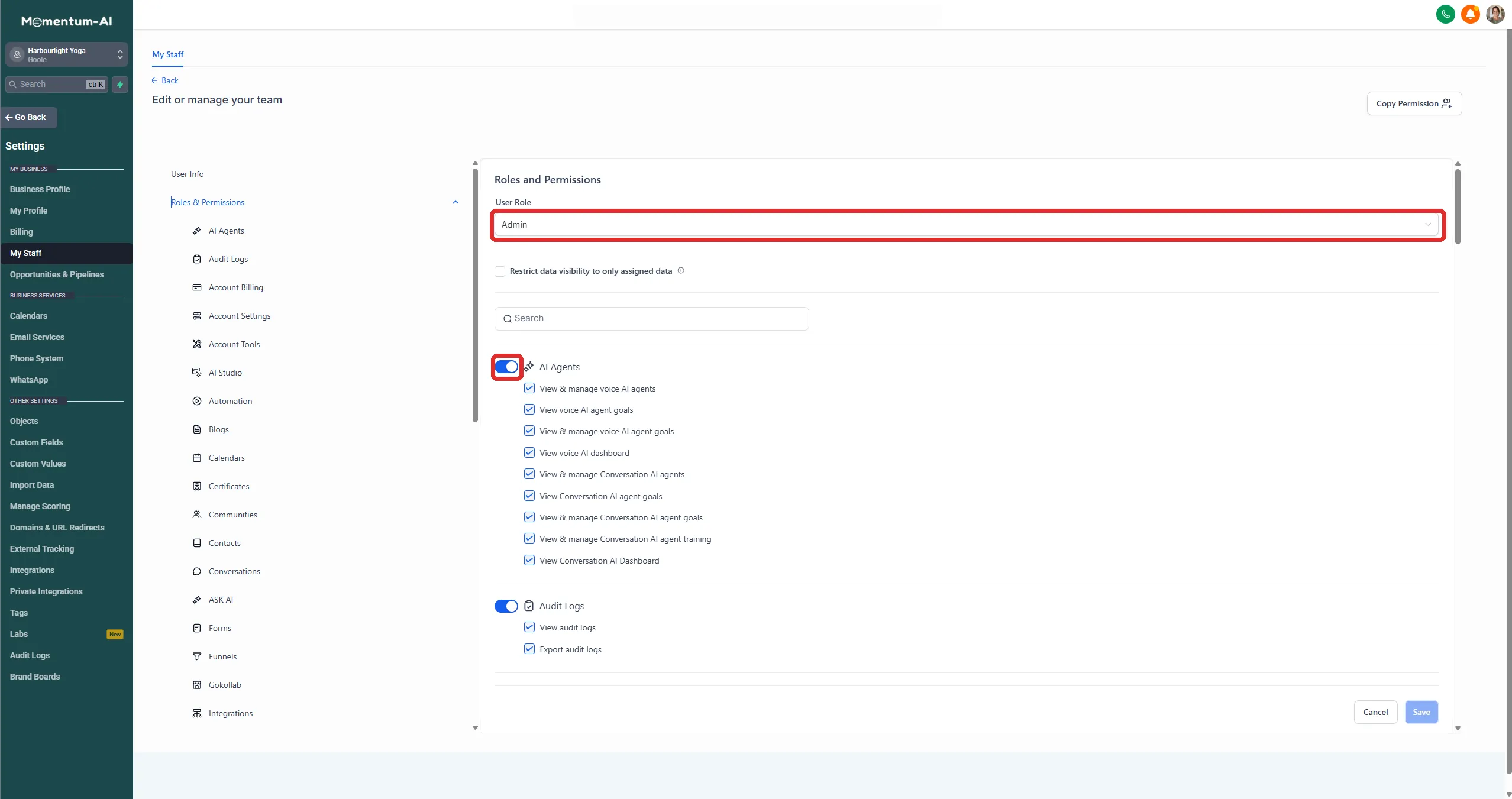 The Roles and Permissions screen with the role dropdown and the per-module toggles highlighted